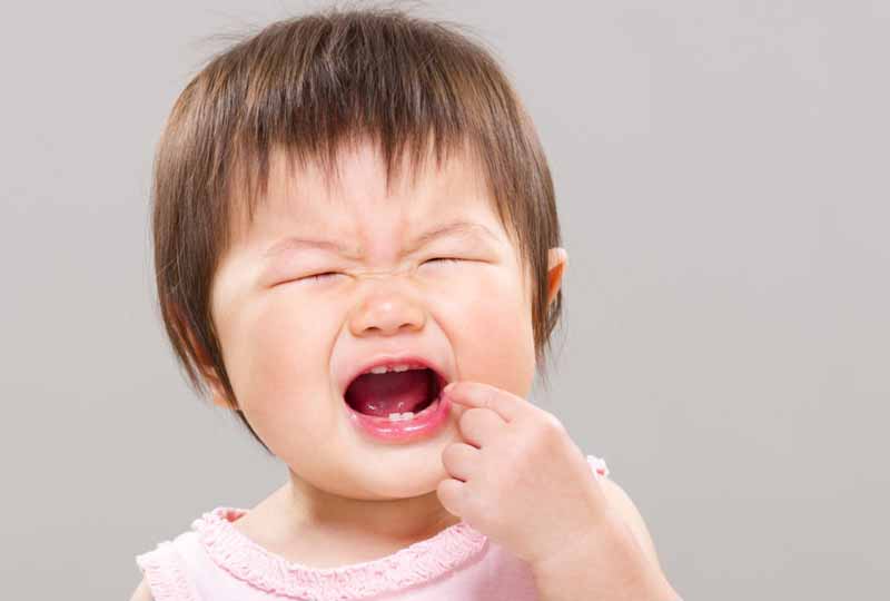 Trẻ 7 tháng chưa mọc răng có nguy hiểm không?